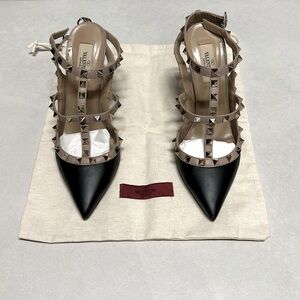 Gorgeous two tone Valentino Rockstud heels. Little wear and tear.